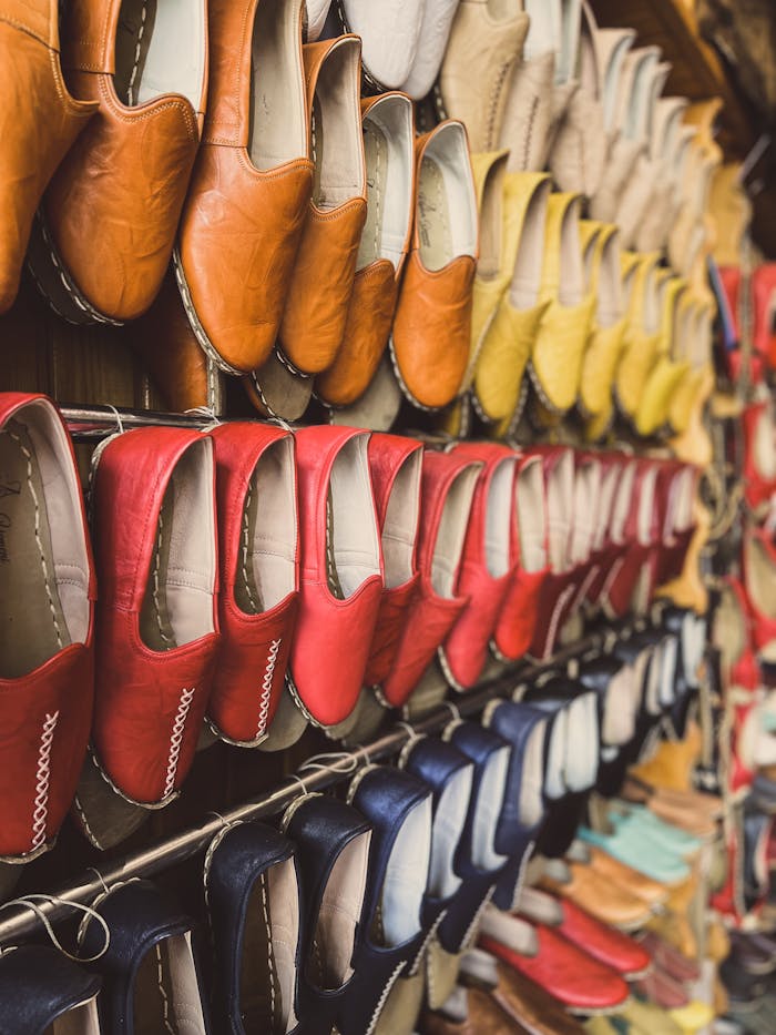 Rows of colorful traditional Turkish shoes displayed in Şahinbey market, Gaziantep.